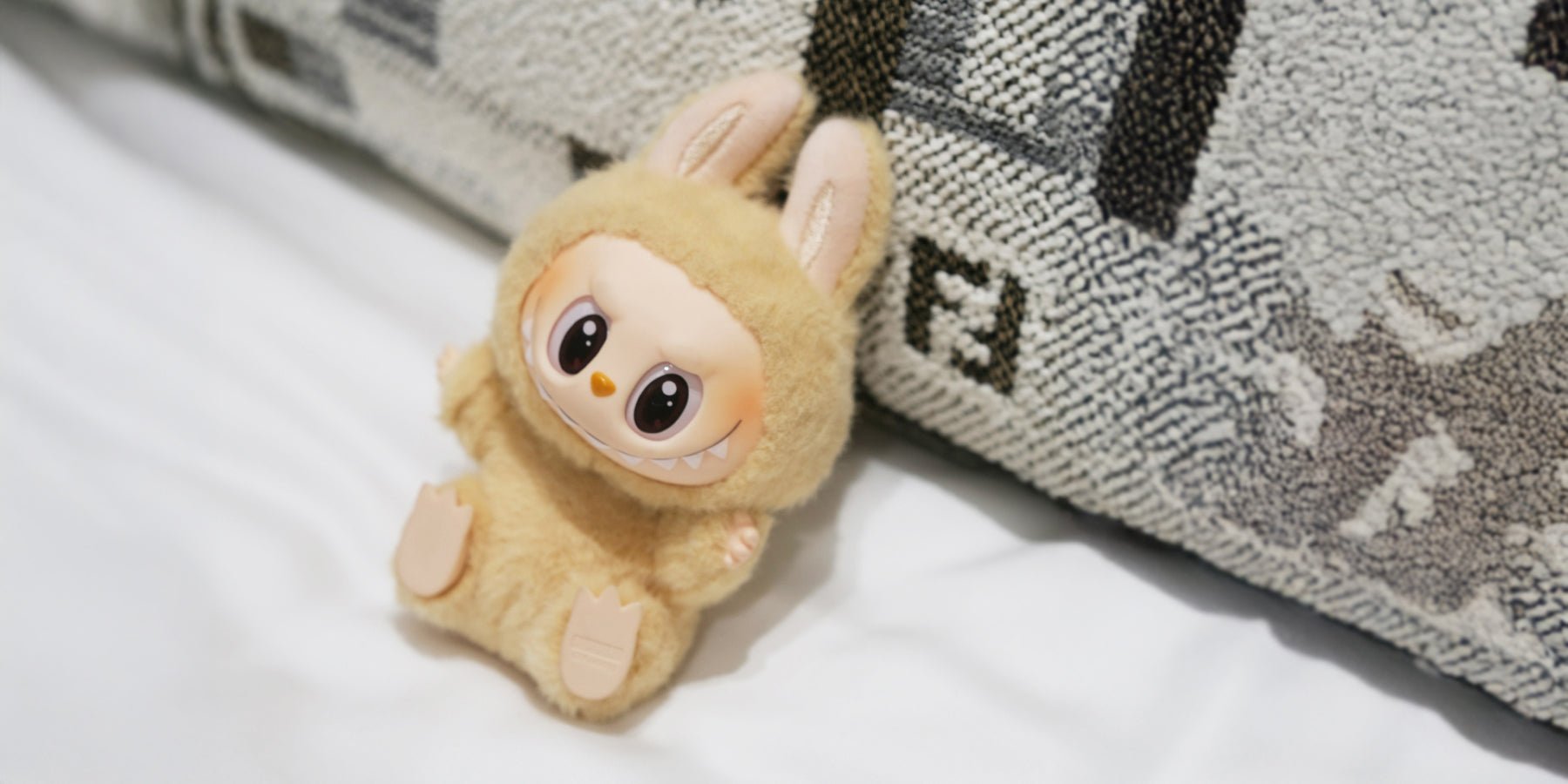Labubu aan je designertas: wat is het, waarom wil iedereen het en alternatieven - Happlify